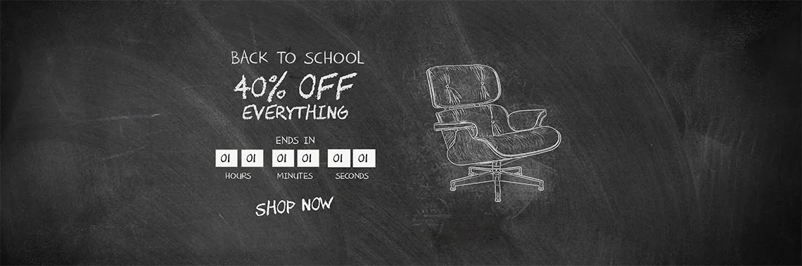 Back to School banner drawn in chalk on a blackboard, with an Eames lounge chair