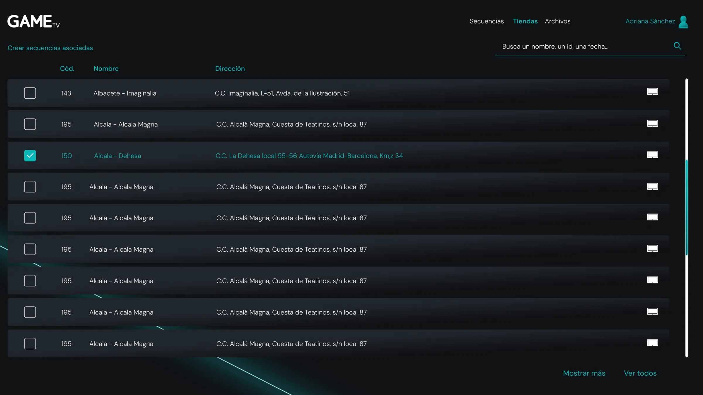 Listado de tiendas: código, nombre y dirección completa de cada tienda GAME, con una fila seleccionada en teal