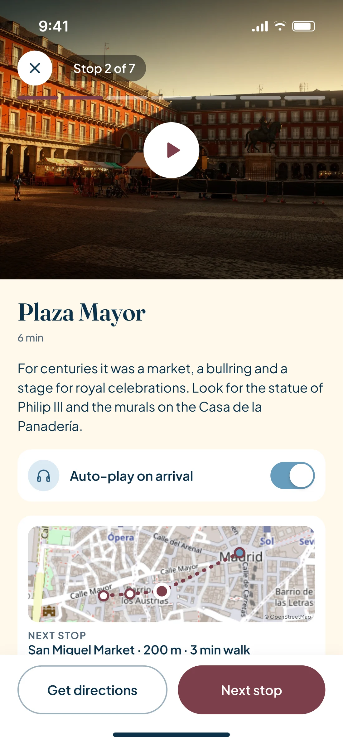 Tour in progress, stop 2 of 7 at Plaza Mayor: video, text, auto-play on arrival and a real map with the next stop
